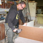Tim assembles a cabinet at Cascade Casework in Albany OR